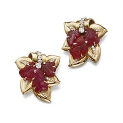 CARTIER A PAIR OF GOLD, RUBY AND DIAMOND CLIP BROOCHES Each of foliate design, the gold leaves en...