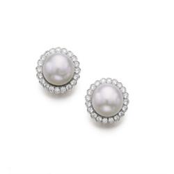 A PAIR OF SOUTH SEA CULTURED PEARL AND DIAMOND EARCLIPS Each set with a cultured pearl measuring ...
