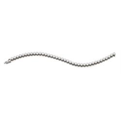 A DIAMOND LINE BRACELET Collet-set with 38 brilliant-cut diamonds weighing approximately 6.00 car...