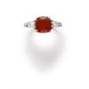 Image 1 : A FINE RUBY AND DIAMOND RING The antique cushion-cut ruby weighing 3.61 carats to the tapered bag...