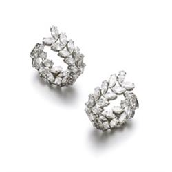 A PAIR OF DIAMOND EARRINGS Each of C-scroll design, set with a twin-line of marquise-shaped diamo...