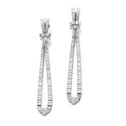 A PAIR OF PLATINUM AND DIAMOND EARPENDANTS Each of ribbon design, channel-set with baguette-cut d...