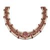 Image 1 : A RUBY AND DIAMOND NECKLACE Designed as an openwork band with graduated oval-cut ruby chevrons an...