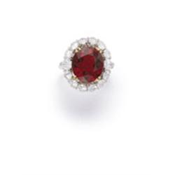 A RED SPINEL AND DIAMOND RING The oval-shaped red spinel weighing 6.90 carats within a surround o...