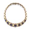 Image 1 : BULGARI A GOLD, SAPPHIRE, DIAMOND AND RUBY NECKLACE The flexible tapering band designed as a seri...