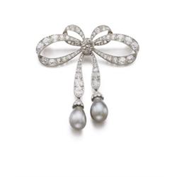 A BELLE EPOQUE DIAMOND AND NATURAL PEARL BROOCH Designed as a ribbon bow set with old mine, rose ...