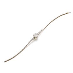 Property of a Lady A BELLE EPOQUE DIAMOND BRACELET Centering upon an old European-cut diamond wei...