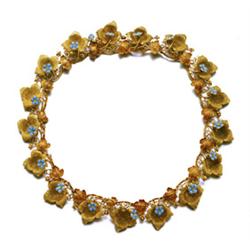 A RARE ANTIQUE GOLD AND TURQUOISE NECKLACE Of foliate design, composed of a series of two-toned g...