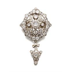 AN ANTIQUE DIAMOND BROOCH/PENDANT The openwork oval plaque of quatrefoil design, set with old min...