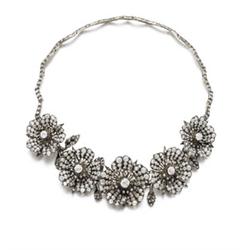 Property of a Lady AN ANTIQUE DIAMOND NECKLACE The front, composed of five slightly graduated flo...