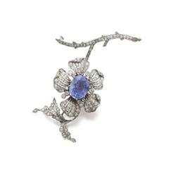 Property of a Gentleman A SAPPHIRE AND DIAMOND FLOWER BROOCH The flower mounted en tremblant enha...