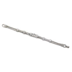 MARCHAK AN ART DECO DIAMOND LADY'S WRISTWATCH The rectangular dial with Arabic numerals, the beze...