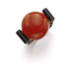 AN ART DECO CORAL AND ONYX RING Set with a coral cabochon enhanced by onyx shoulders, mounted in ...