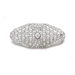 A DIAMOND BROOCH 260 Of pierced design, the shaped lozenge plaque set throughout with circular-cu...