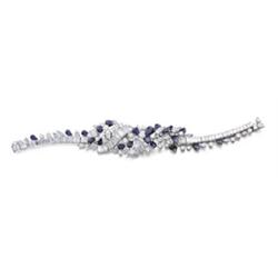 Property of a Lady A SAPPHIRE AND DIAMOND BRACELET The central section designed as a cluster rand...