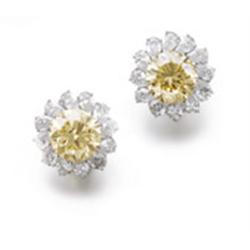 A PAIR OF FANCY YELLOW DIAMOND AND DIAMOND EARRINGS Each set with a brilliant-cut fancy yellow di...