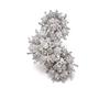 Image 1 : From a European estate AN ART DECO DIAMOND CLIP BROOCH Designed as three flowerheads, set with ol...