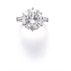 Property of a Lady A DIAMOND RING The brilliant-cut diamond weighing 7.47 carats to the tapered b...