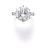 Image 1 : Property of a Lady A DIAMOND RING The brilliant-cut diamond weighing 7.47 carats to the tapered b...