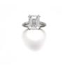 Image 1 : A SINGLE STONE DIAMOND RING The rectangular-cut diamond weighing 5.41 carats to the platinum hoop...