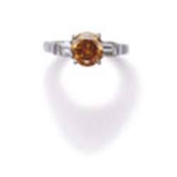 A FANCY DEEP YELLOWISH ORANGE DIAMOND RING The fancy yellowish orange brilliant-cut diamond weigh...