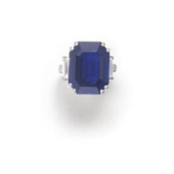 VAN CLEEF & ARPELS A SAPPHIRE AND DIAMOND RING The rectangular-shaped sapphire weighing 25.19 car...