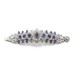 Property of a Lady A SPECTACULAR SAPPHIRE AND DIAMOND BRACELET Designed as seven sapphire cabocho...