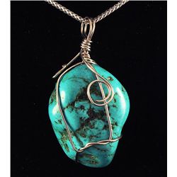 NATURAL 139.55CTW TURQUOISE WIRE WRAPPED PENDANT