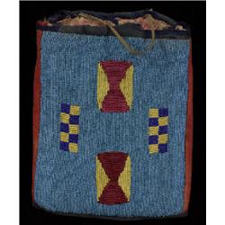 Northern Plains Beaded Bag Edged with Red Trade Cloth ca. 1910  9 1/2" H. 7 1/2" W.  Good Conditi…