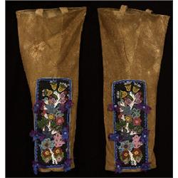 An Exceptional Pair of Old Cree Deerskin Leggings with Finely Beaded and Ribbon Panels ca. 1890  …