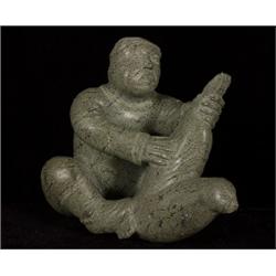 Inuit Soapstone Hunter and Seal by Eda Eyittoaq 10" W. 9" H.  Fine Condition                     …