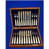 Image 1 : A CASED SET OF TWELVE FRUIT KNIVES AND TWELVE FORKS, SHEFFIELD, 1906, with mother-of-pearl handle...