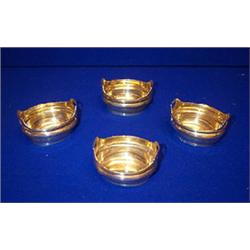 A SET OF FOUR TWO HANDLED OVAL SALT CELLARS, LONDON, 1803, T. robins, in the form of tubs, with g...