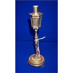 A PLATED CIGAR LIGHTER, in the form of a lamp standard....