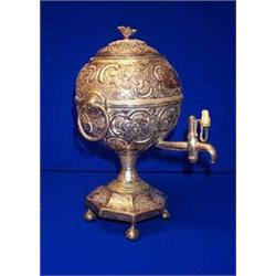 A GLOBULAR EMBOSSED SHEFFIELD PLATE TEA URN, EARLY 19th CENTURY, with flower head finial, ivory h...