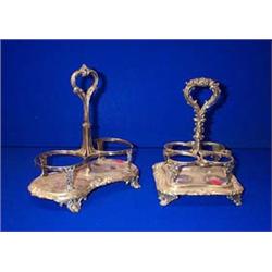 TWO SHEFFIELD PLATE CRUET FRAMES, c.1840, with central handles....