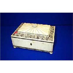 AN ANGLO INDIAN IVORY CASKET SHAPED BOX, MID 19th CENTURY, the lid with flowerhead finial and wit...