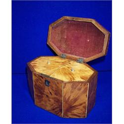 A OCTAGONAL TORTOISESHELL TEA CADDY, EARLY 19th CENTURY, with domed lid, fitted interior, 18cms...