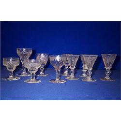 A WINE GLASS, IN THE MANNER OF COLLINS OF DUBLIN, c.1800, the bowl engraved with a band of dots a...