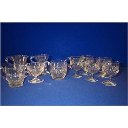 A BARREL SHAPED CUT PUNCH CUP, WATERFORD, c.1810; and nine others, including a set of five, 19th...