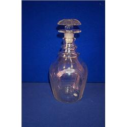 A WATERFORD DECANTER, c.1795, ATTRIBUTED TO THE PENROSE FACTORY, plain with three neck rings, the...