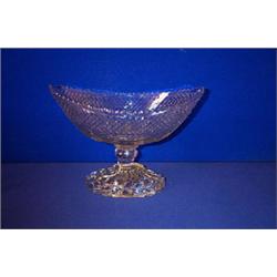 A PRISMATIC CUT NAVETTE SHAPED BOWL, irish EARLY 19th CENTURY, with waved rims and diamond cuttin...