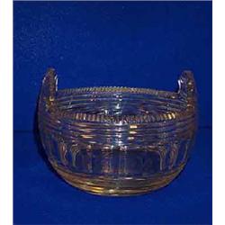A FLANGED CIRCULAR BUTTER BOWL, c.1830, prismatic cut a with faceted body, 15cms diameter., €...