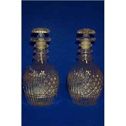 A PAIR OF IRISH STYLE MOULD BLOWN DECANTERS, with triple neck rings and mushroom stoppers,, eac...