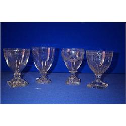 A FINE OVOID RUMMER, PROBABLY CORK, c.1810, engraved ribbon tied swags and on a moulded lemon squ...