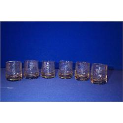 A SET OF SIX DRAM GLASSES, EARLY 19th CENTURY, PROBABLY CORK, engraved with ribbon tied leaf swag...