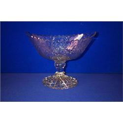 A FLAT CUT NAVETTE SHAPED BOWL, LATE 18th CENTURY, PROBABLY CORK, with waved rim, the body on kno...