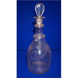 A MOULD BLOWN DECANTER, ALMOST CERTAINLY BELFAST, c.1800, with two double neck rings, the upper b...