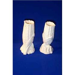 A PAIR OF BELLEEK "INDIAN CORN SPILL" VASES, FIRST PERIOD, (1863-1890), on rocky bases, impressed...