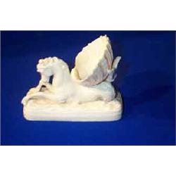 A BELLEEK SEA HORSE AND SHELL, FIRST PERIOD, (1891-1926), black printed mark, 12.5cms long.,...